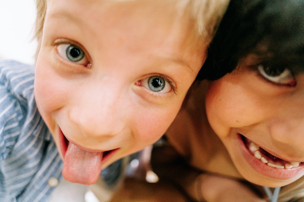 Two kids making silly faces
