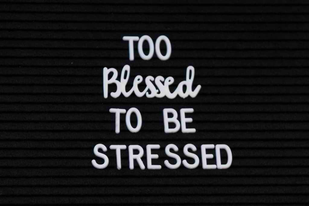 Too Blessed to be Stressed white on black background